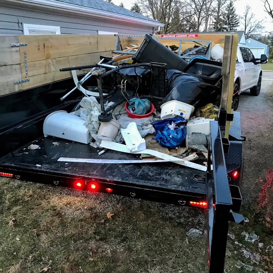 Roll-off dumpster delivered to a residential driveway in Licking